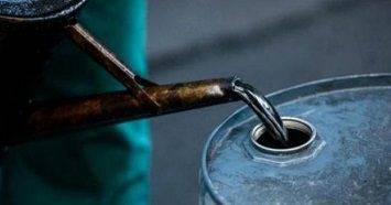 Black Diesel being poured into a container.